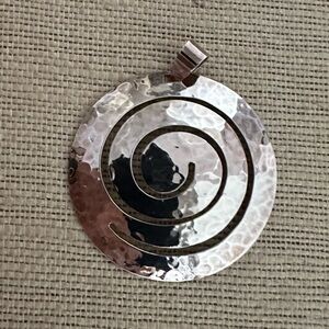 Sterling silver swirl medallion pendant